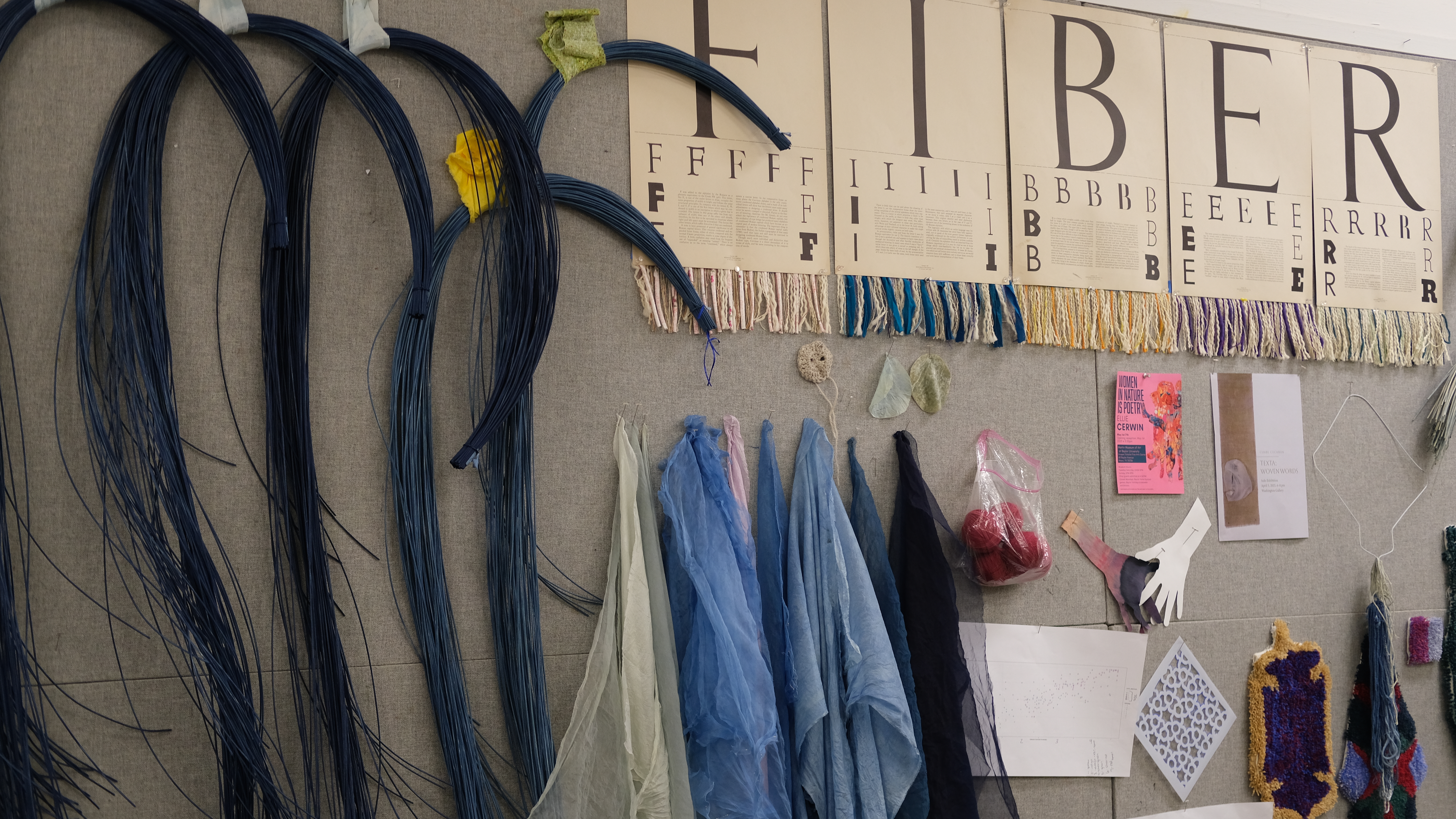 indigo dyed reeds in the fiber studio showing the key for the colors on the panels